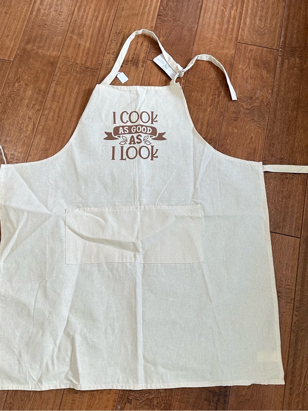 Cream Kitchen Apron with Brown Text "I Cook As Good As I Look"